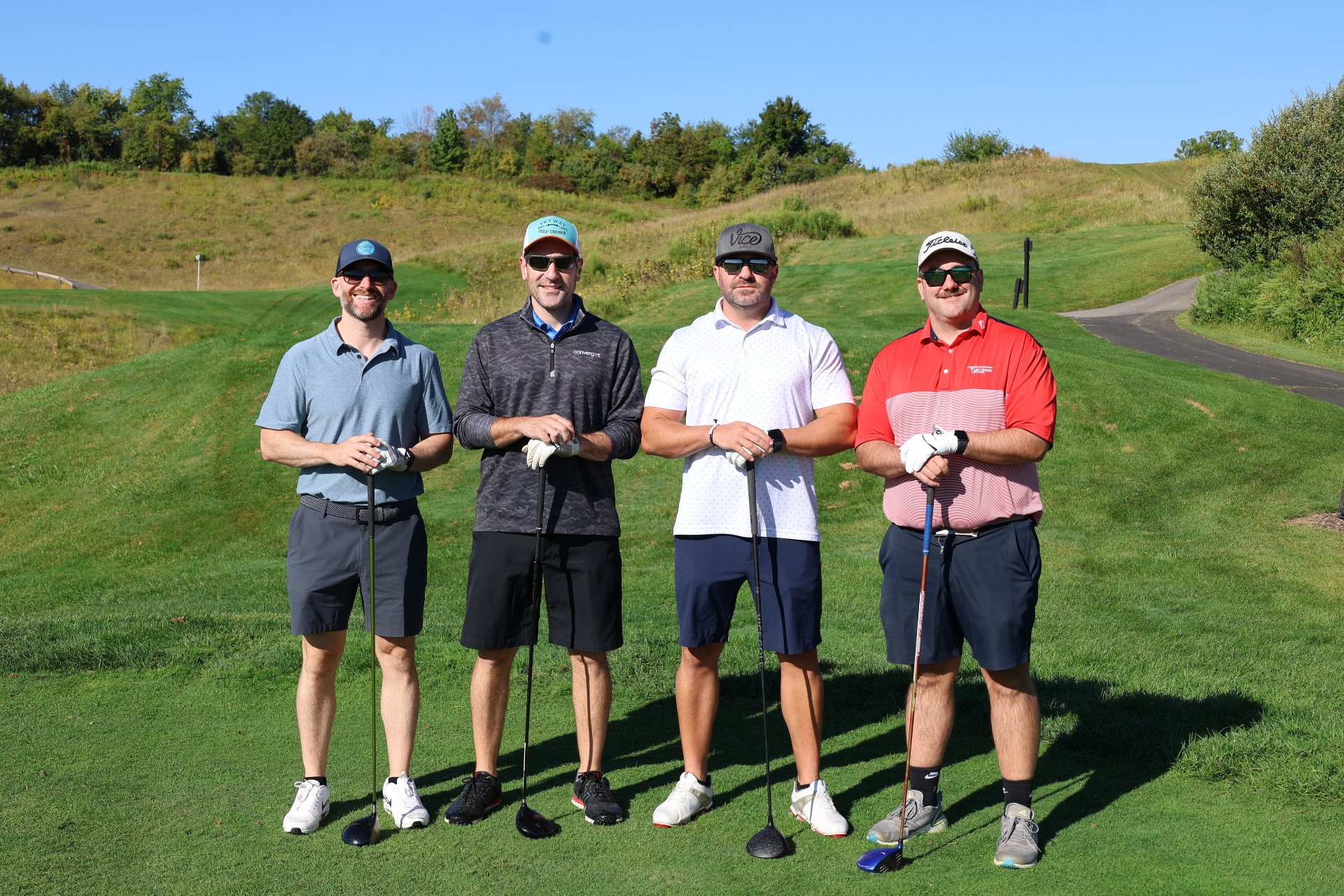 Foursome with drivers