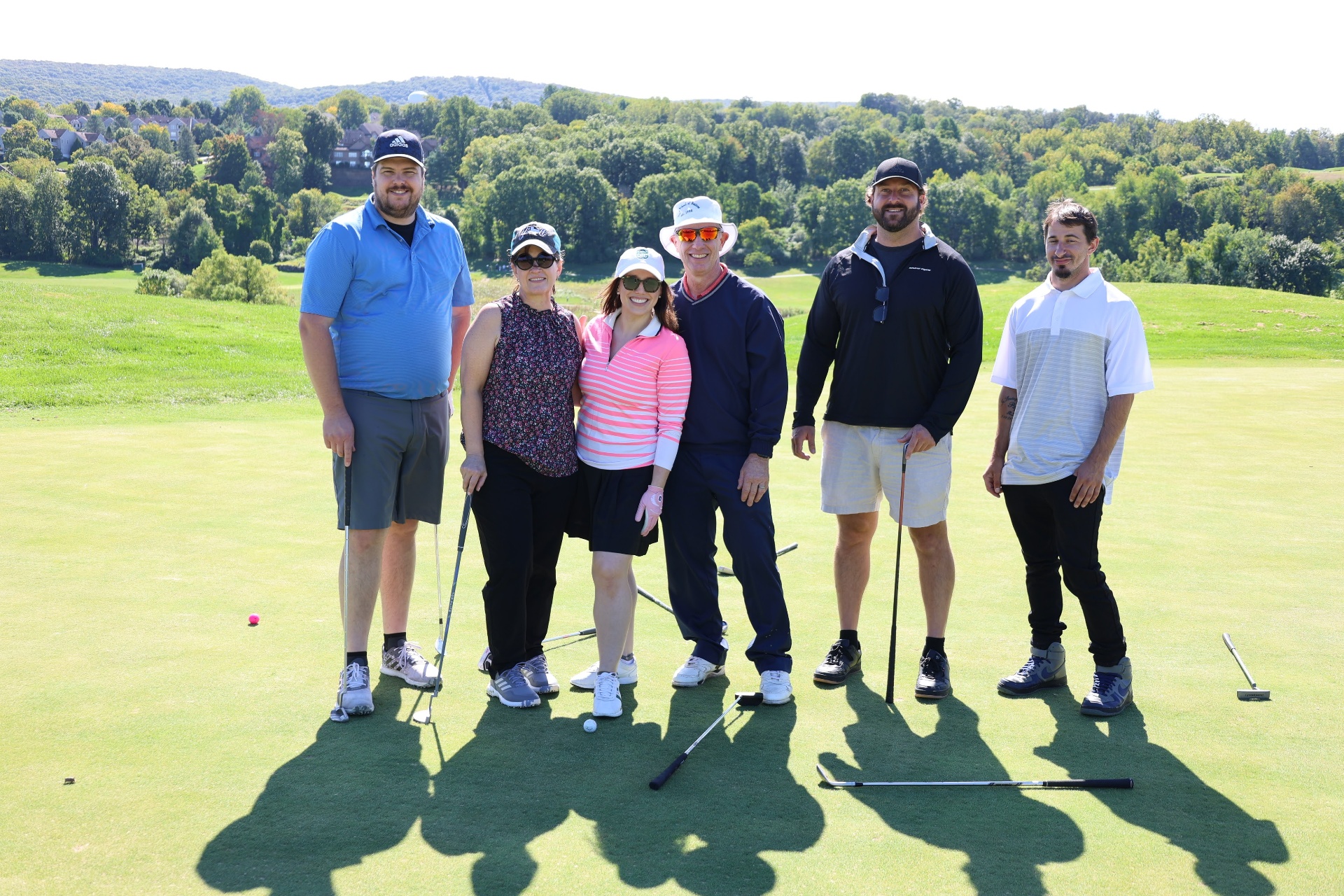 Foursome group photo on the green