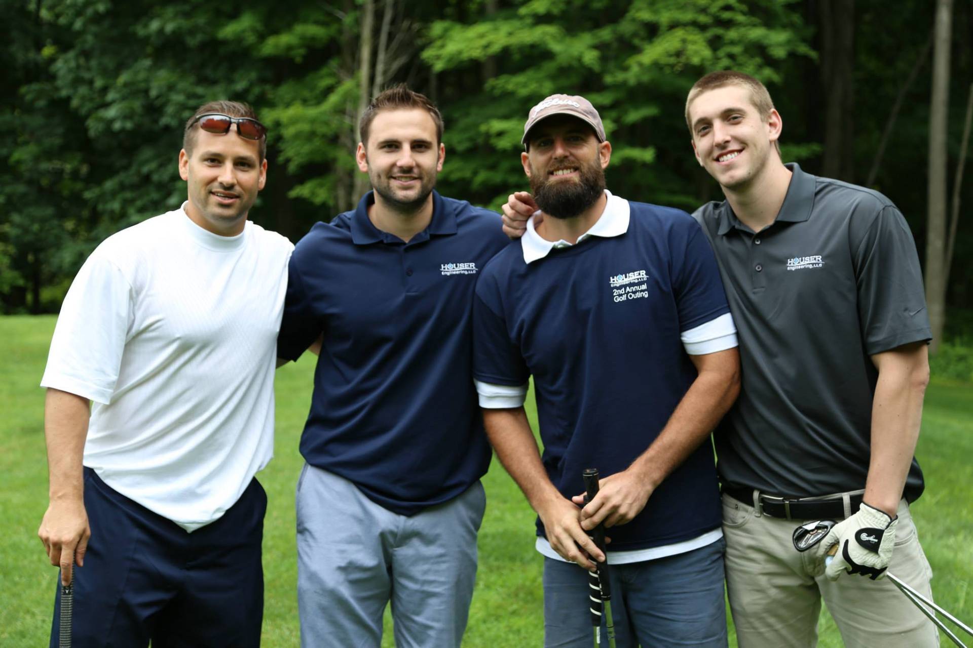 Houser Engineering team on the course
