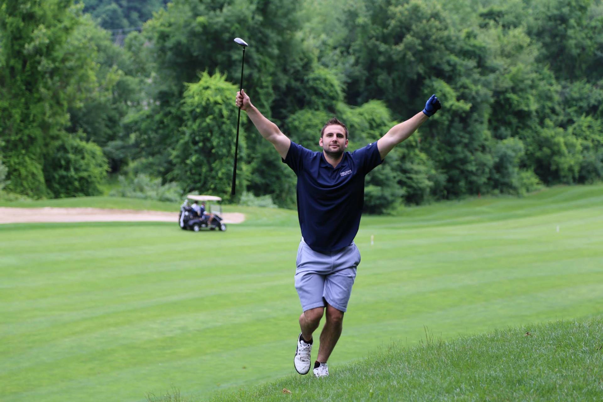 Golfer celebrating a great shot